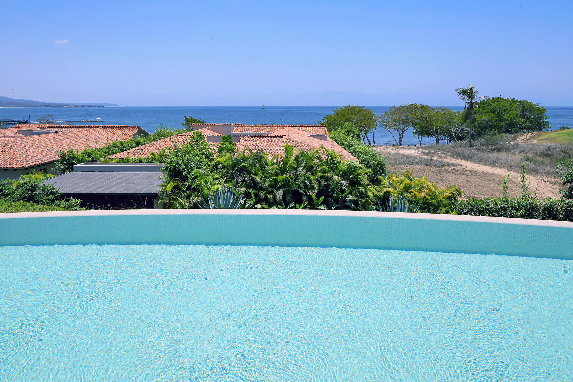 Casa Rincon del Mar – 4-Bedroom Ocean-View Villa in Porta Fortuna, Punta Mita — outdoor living and pool area — luxury villa in Punta Mita